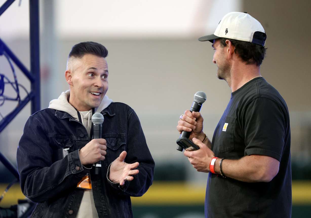 Pastor Jeff McCullough and David Butler speak at the Why I Believe Interfaith Easter Celebration at the Ballpark at America First Square in South Jordan on Monday.