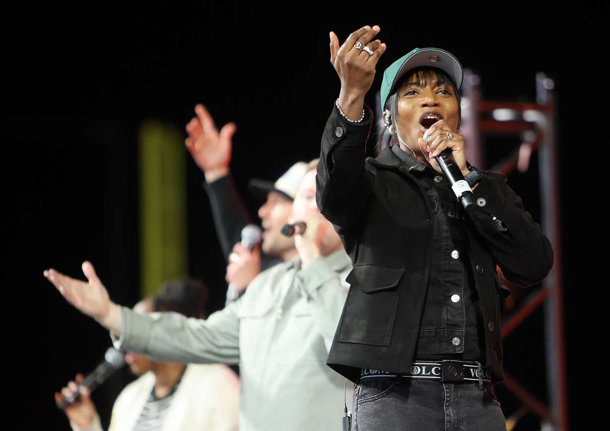 Mina Thomas Brett performs with The King Will Come at the Why I Believe Interfaith Easter Celebration at the Ballpark at America First Square in South Jordan on Monday.