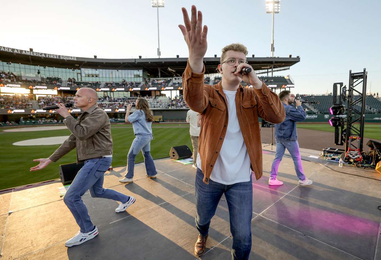 Jimmy Mohlman performs with J209 at the Why I Believe Interfaith Easter Celebration at the Ballpark at America First Square in South Jordan on Monday.
