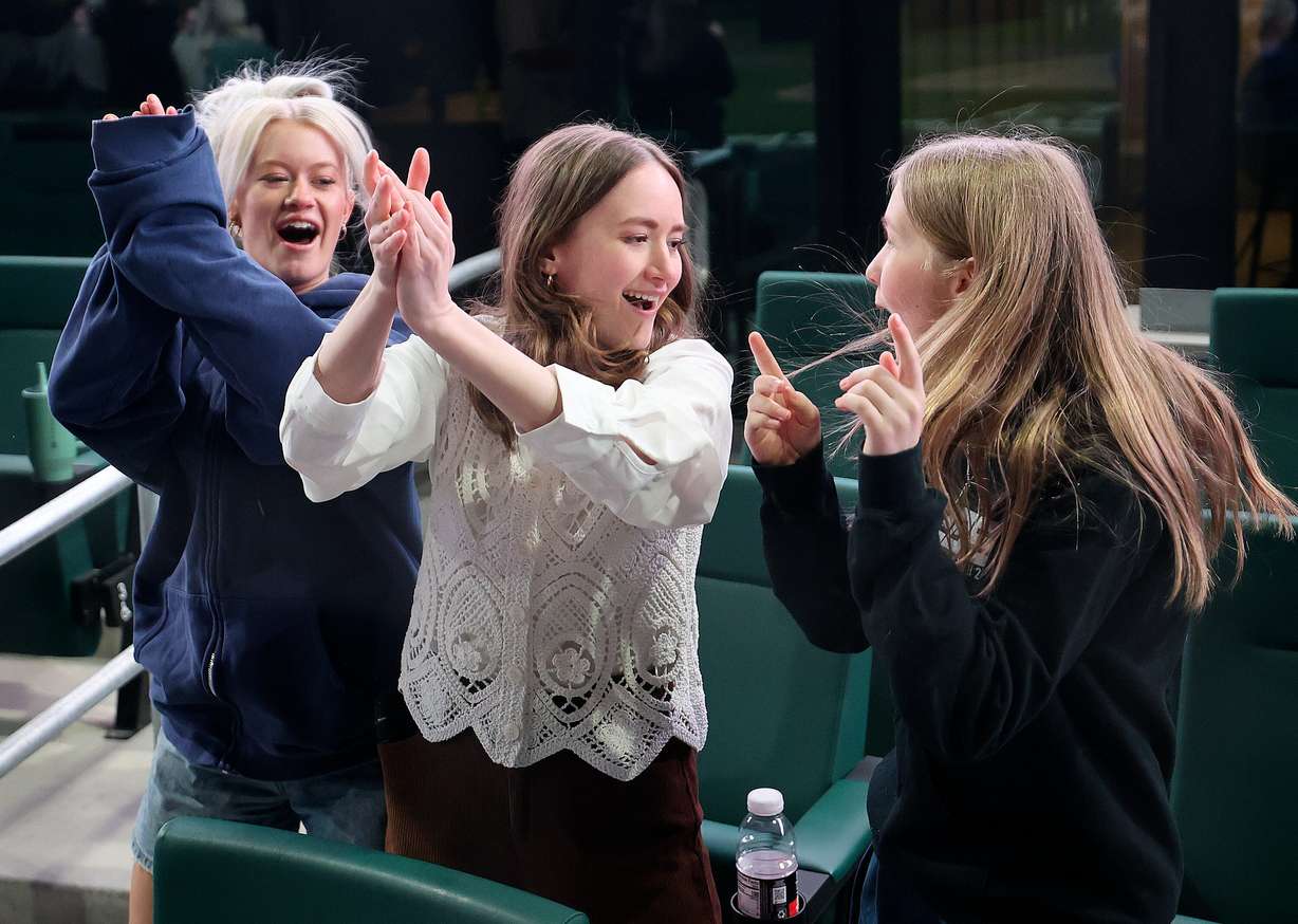 Megan Murphy, Hailey Murphy and Ella Murphy dance as the King Will Come performs at the Why I Believe Interfaith Easter Celebration at the Ballpark at America First Square in South Jordan on Monday. Hailey Murphy is a member of J209.