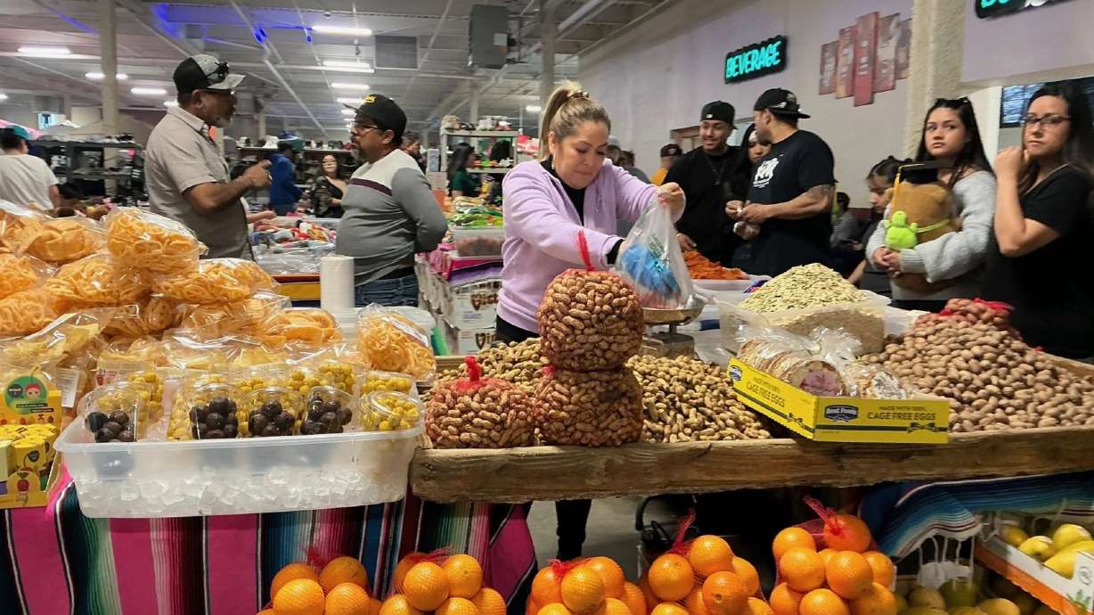 A visitor to the Suami del 801 swap meet in Salt Lake City. It has expanded to serve vendors from the now-shuttered Redwood Swap Meet, with separate plans afoot for a location in Grantsville.