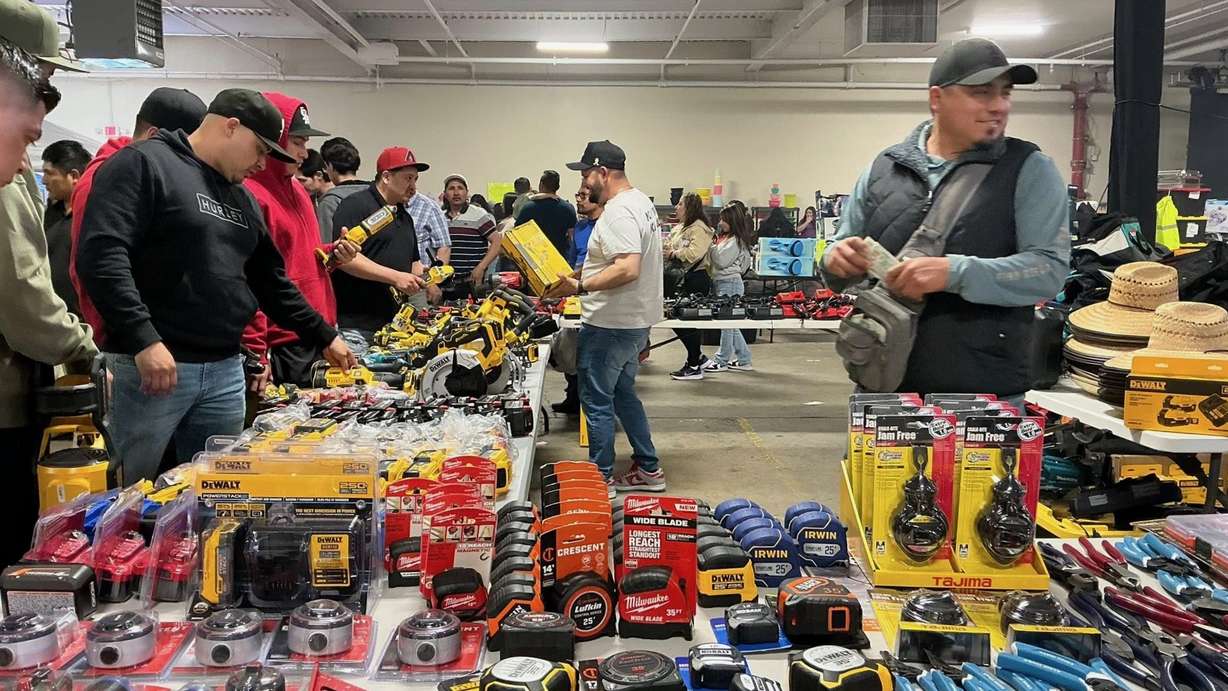Visitors to the Suami del 801 swap meet in Salt Lake City peruse some of the tools and other goods on sale in an undated photo.