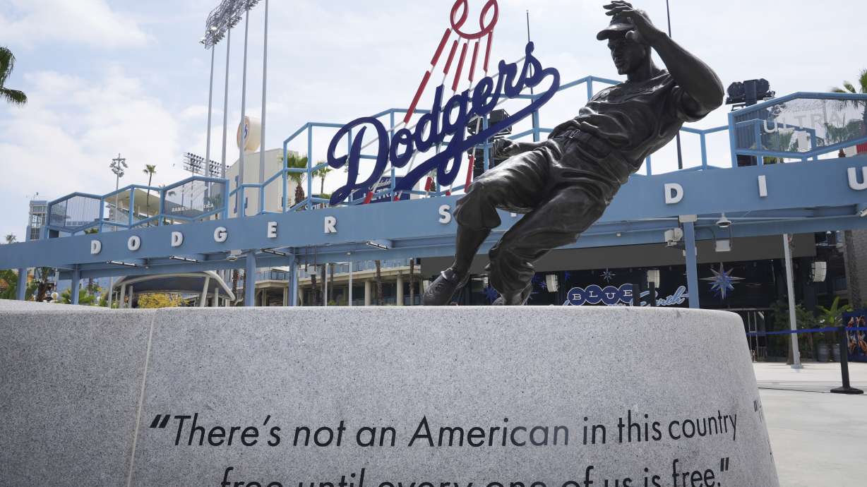 A statue of Jackie Robinson is seen at Dodger Stadium on Jackie Robinson Day before a baseball game between the Los Angeles Dodgers and Colorado Rockies Tuesday, April 15, 2025, in Los Angeles.