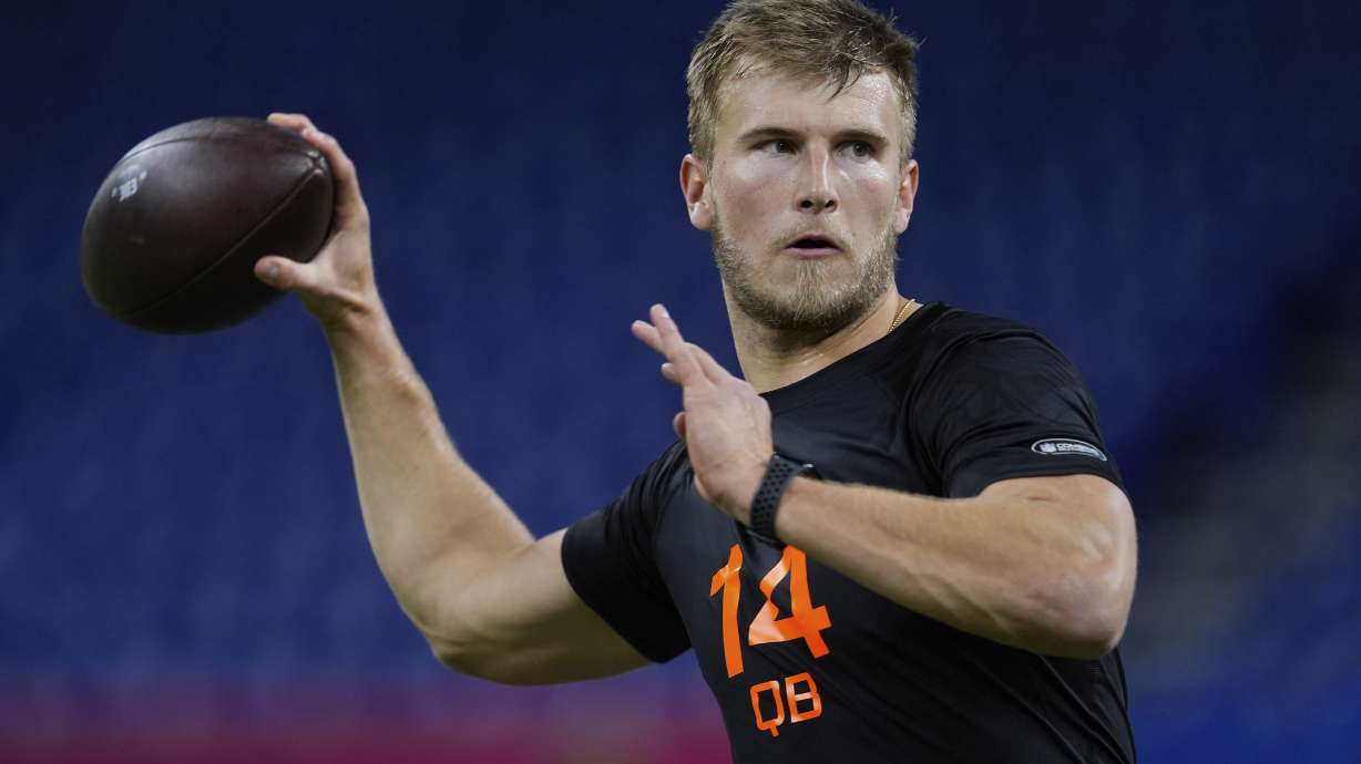 FILE - Louisville quarterback Tyler Shough runs a drill at the NFL football scouting combine in Indianapolis, Saturday, March 1, 2025.