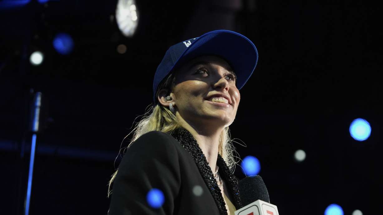 UConn's Paige Bueckers listens during an interview at the WNBA basketball draft, Monday, April 14, 2025, in New York.