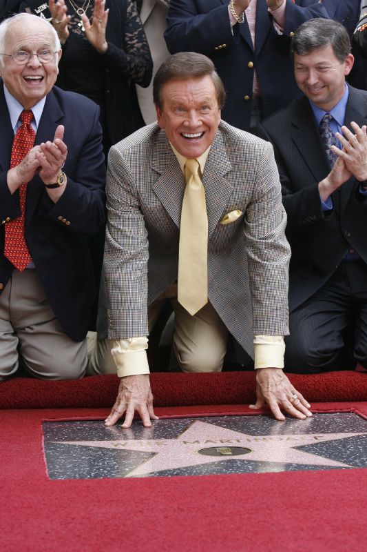 Game show host Wink Martindale smiles for media and supporters after being honored with a star on the Hollywood Walk of Fame, June 2, 2006, in the Hollywood section of Los Angeles.