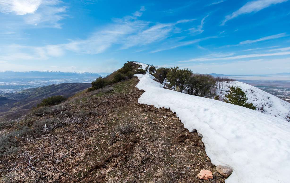 Partial snowmelt is seen by Grandview Peak atop City Creek Canyon in Salt Lake City on Saturday. The area is part of the region's low- to mid-snowpack collection areas.