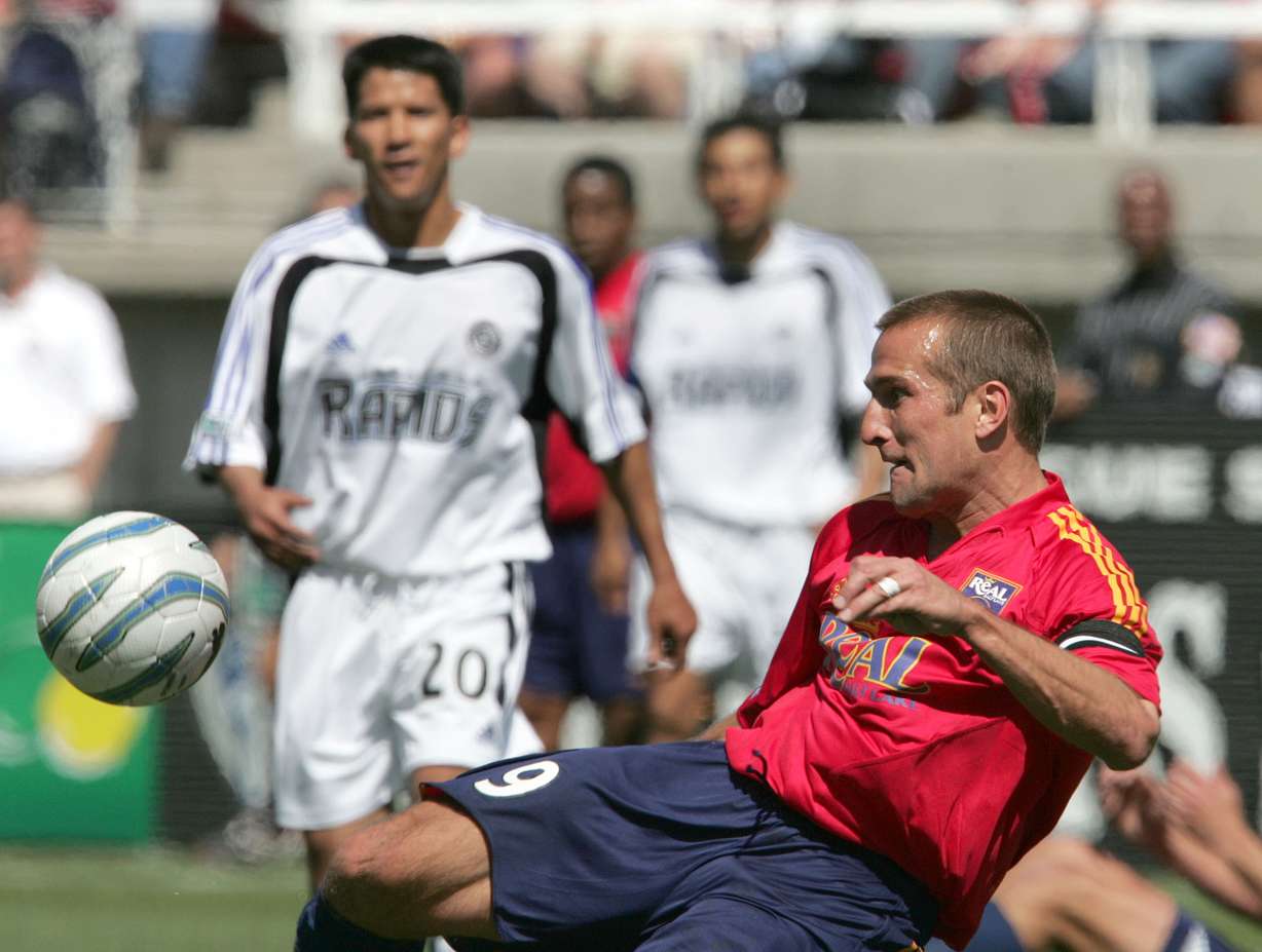 Jason Kreis, right, kicks the ball in the RSL home opener on April 16, 2005.
