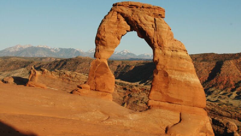 Delicate Arch in southern Utah. Some international travelers are staying home instead of coming to Utah, despite pleas from government officials that Utah is "open for business." - Stock Photo