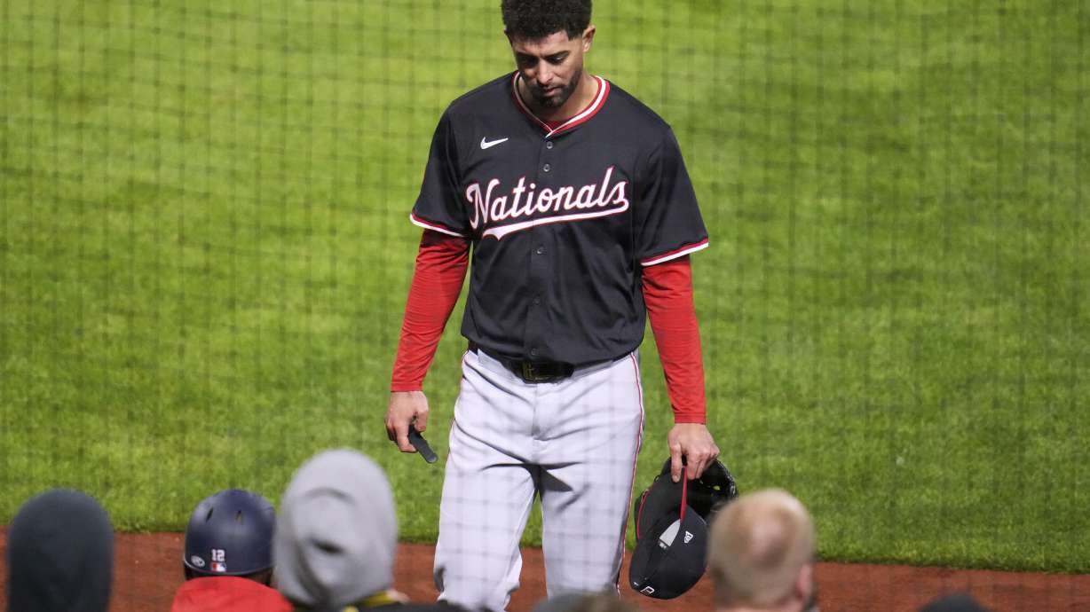 Washington Nationals pitcher Jorge López walks to the dugout after being ejected from a baseball game after hitting a batter and then throwing high and inside to Pittsburgh Pirates' Andrew McCutchen during the seventh inning in Pittsburgh, Wednesday, April 16, 2025.