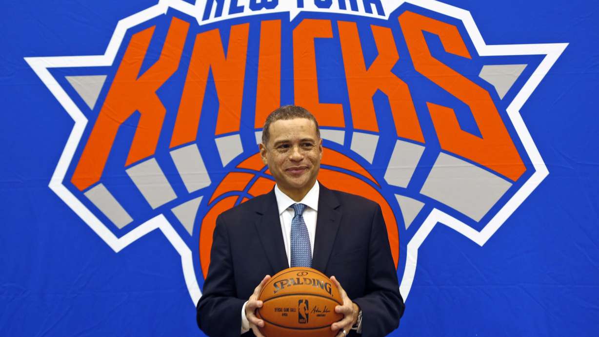 FILE - In this July 17, 2017, file photo, New York Knicks general manager Scott Perry poses for a picture after a news conference in Greenburgh, N.Y.