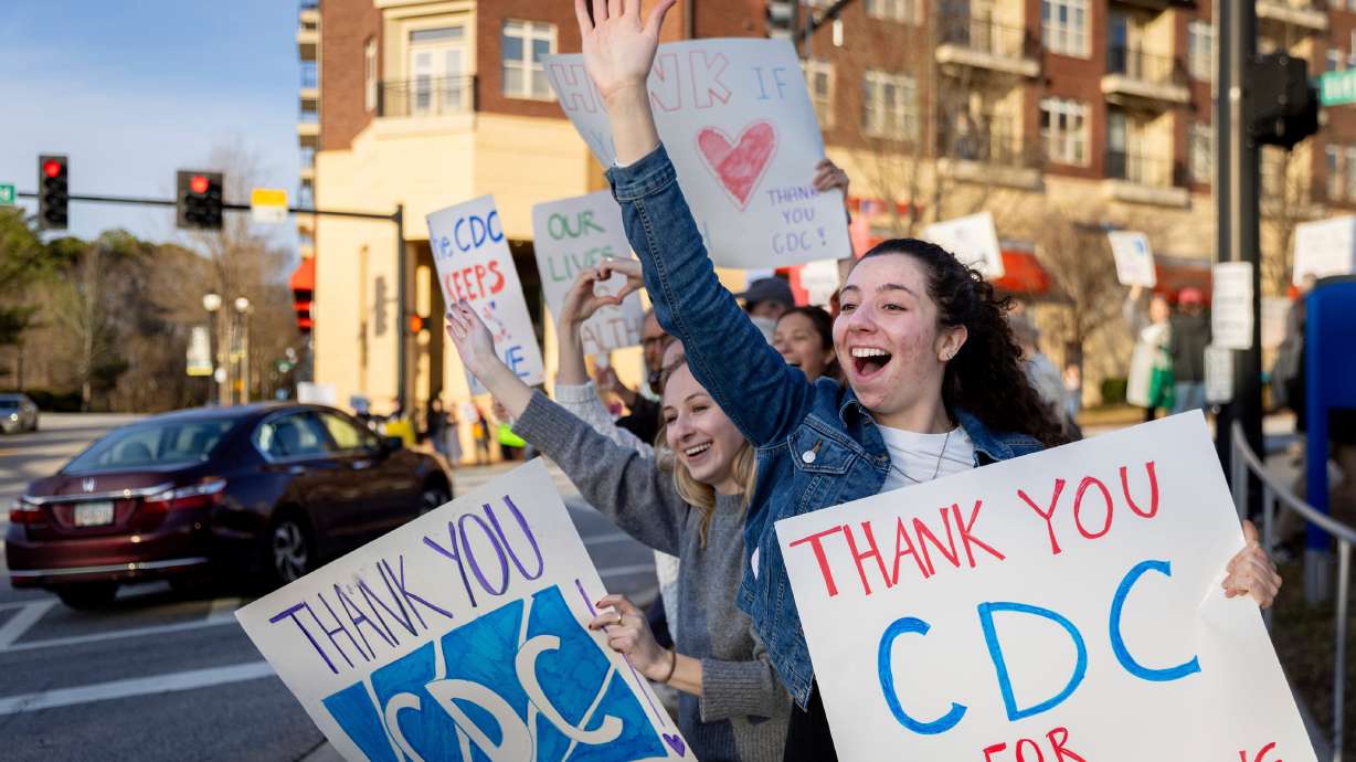 Emory public health students protest against recent Centers for Disease Control and Prevention layoffs, in Atlanta, Feb. 18. Utah voters are split on how they view the cutbacks and layoffs within the federal government.