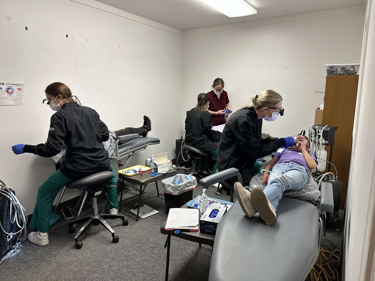 Westmore Elementary School students receive dental care from UVU dental program students at the Westmore Elementary School mobile clinic in Orem on Wednesday.