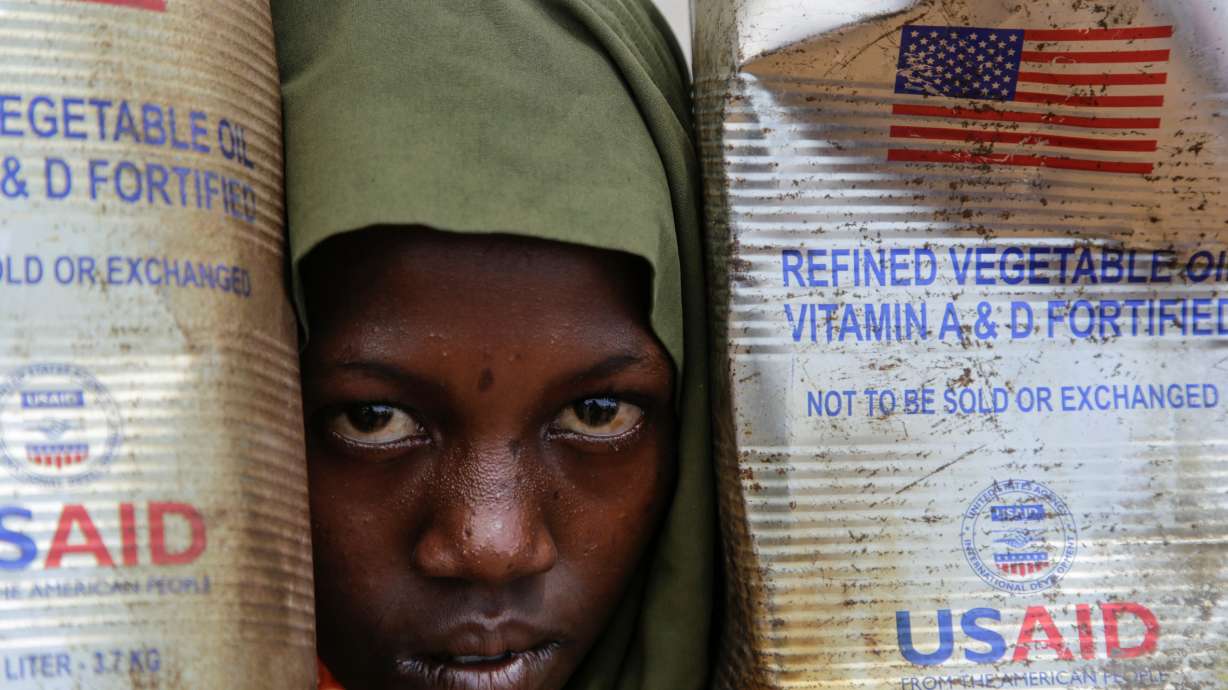 A Somali internally displaced child looks out from her family's makeshift home in Maslah camp on the outskirts of Mogadishu, Feb. 5. Utah voters believe the federal government should spend less on foreign aid, according to recent polling.