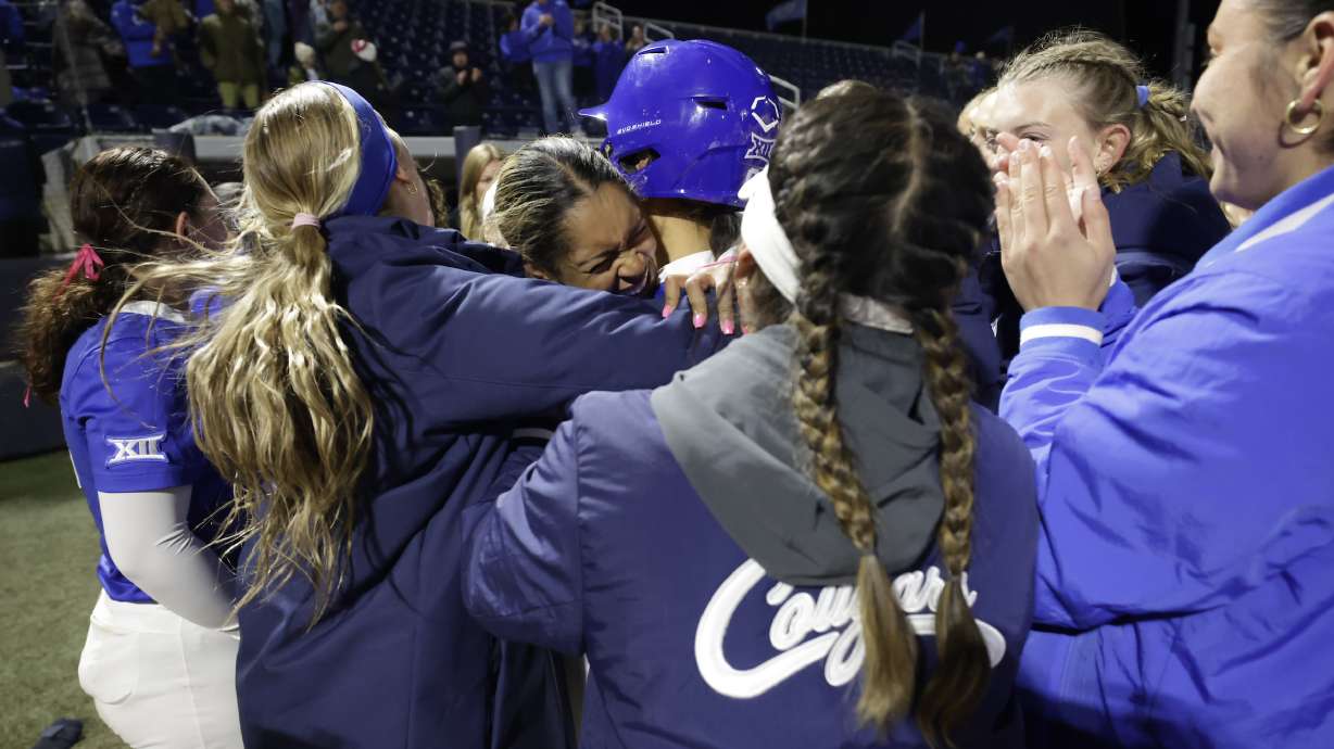 BYU softball celebrates Lily Owens game-winner in the bottom of the eighth inning of a 14-13 win over Utah in Big 12 play, Thursday, April 17, 2025 at Gail Miller Field in Provo.