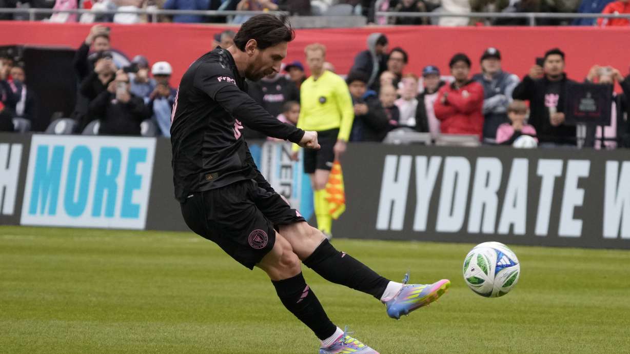 Inter Miami forward Lionel Messi (10) takes a free kick against the Chicago Fire during the second half of an MLS soccer game Sunday, April 13, 2025, in Chicago.