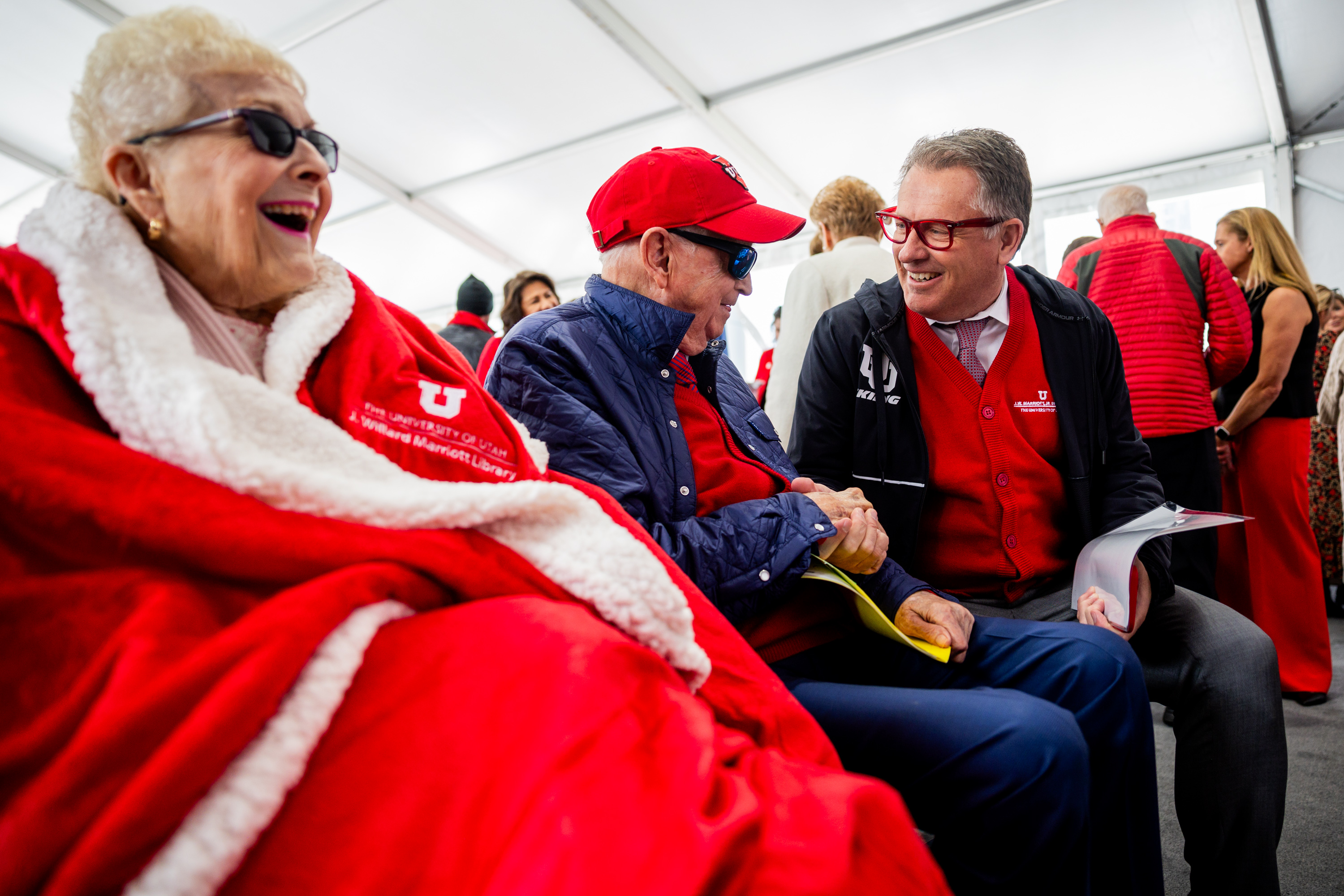 University of Utah President Taylor Randall, right, greets Bill Marriott, center, and Donna Marriott, left, before the school reveals a gift from the J. Willard and Alice S. Marriott Foundation in Salt Lake City on Friday.