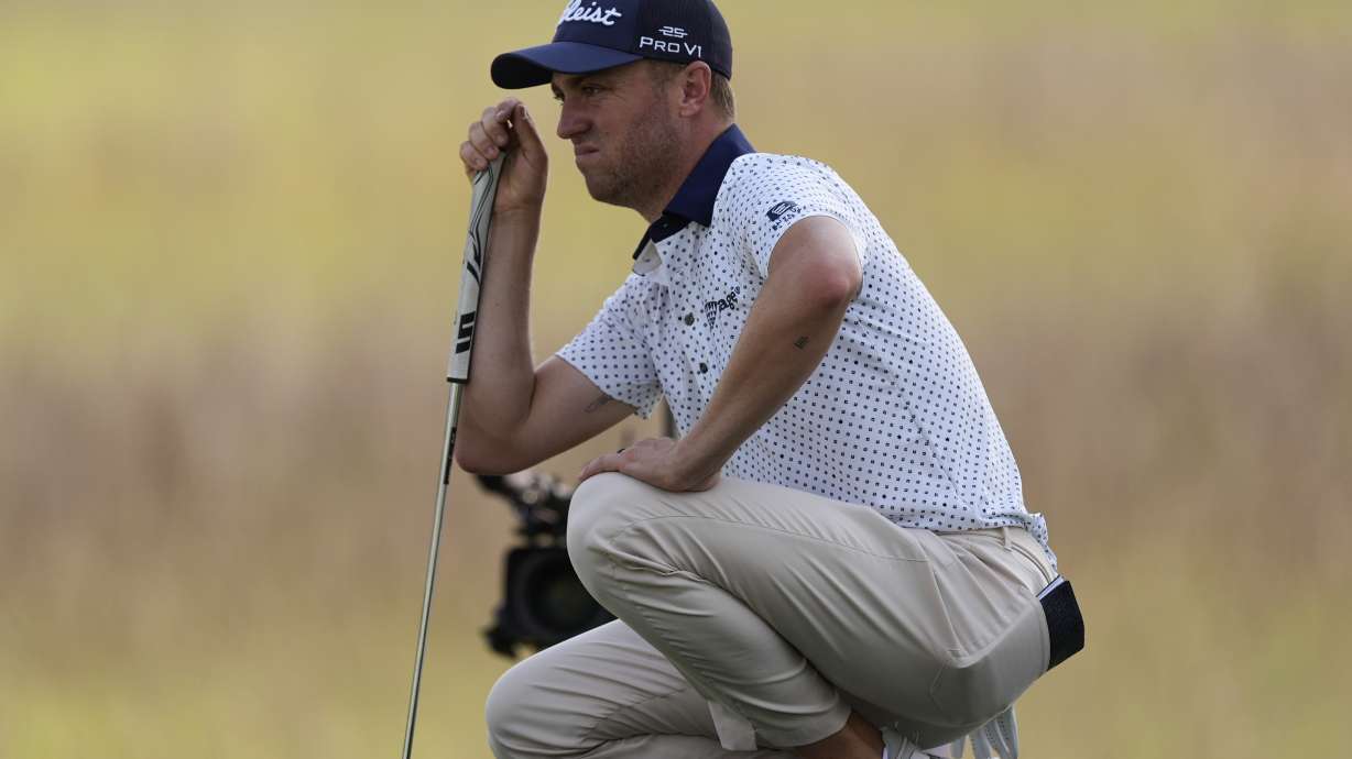 Justin Thomas lines up a putt on the 17th green during the second round of the RBC Heritage golf tournament, Friday, April 18, 2025, in Hilton Head Island, S.C.