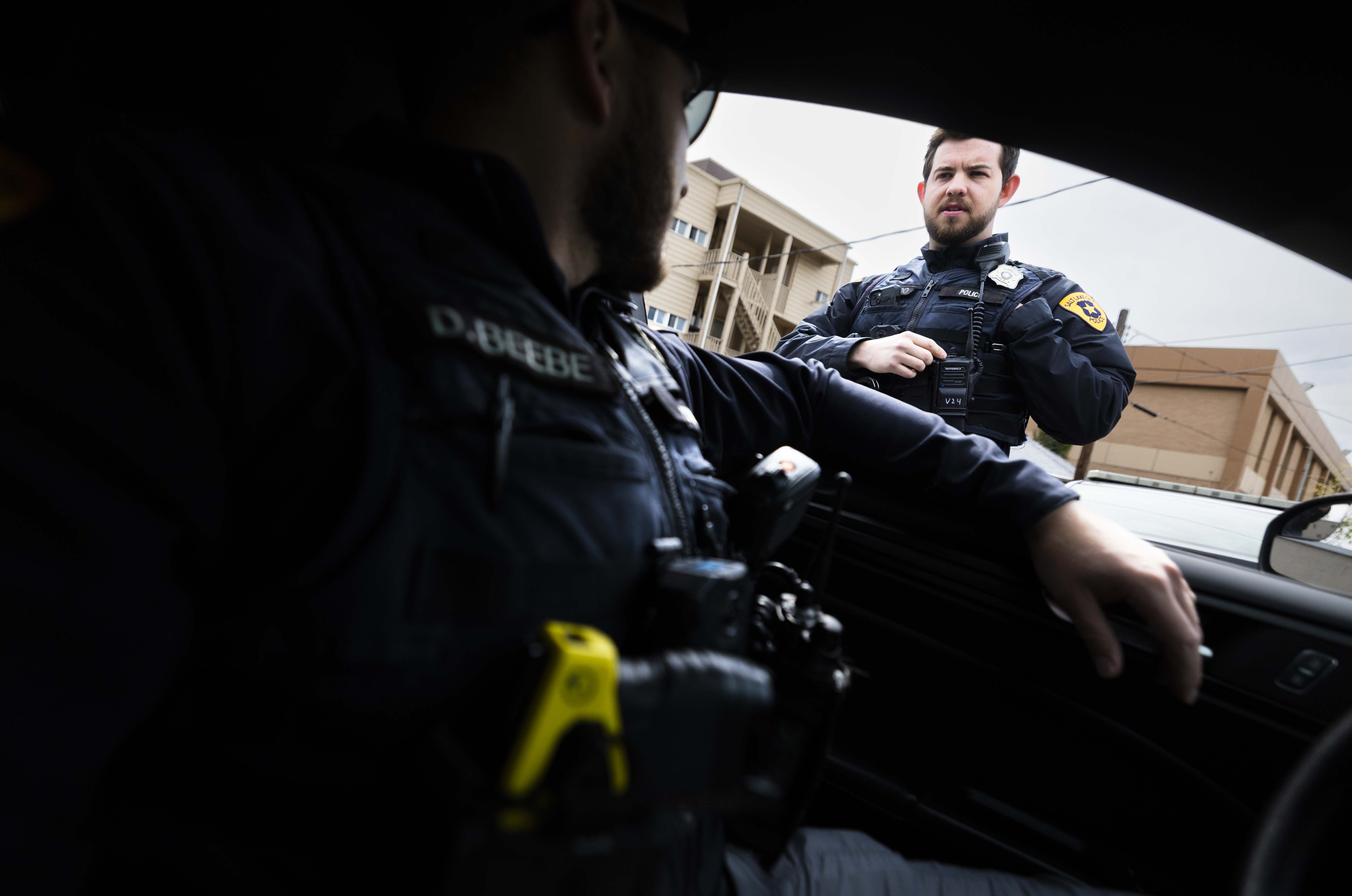 Salt Lake police detective Dalton Beebe, left, and officer Brad Donahoo, right, work in Salt Lake City on Thursday. Leaders passed memorandum of understanding with the Salt Lake City Police Association over a three-year agreement on Tuesday.