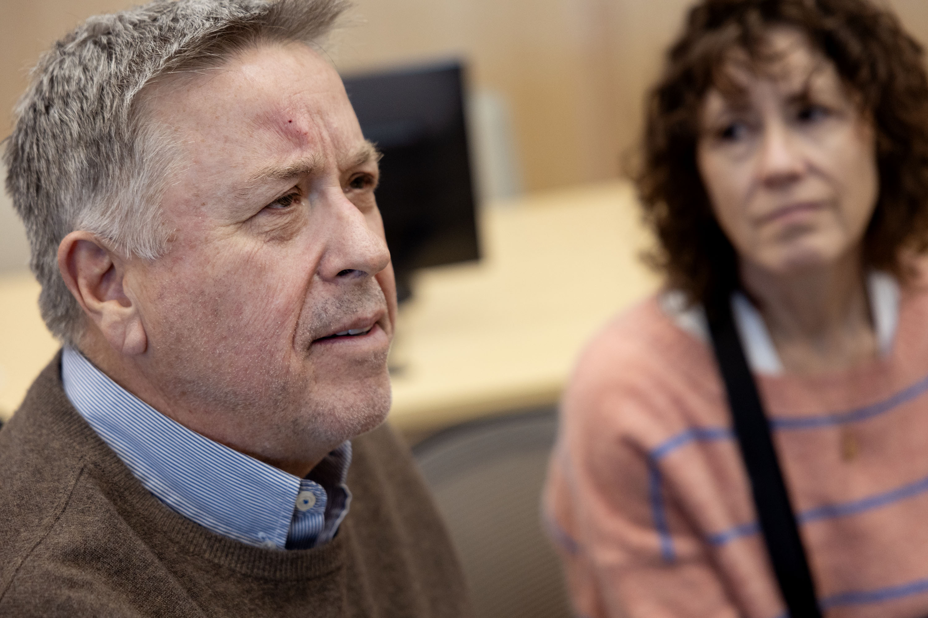 Brad and Deanna Neff speak about their immigrant neighbors, focus of U.S. pressure to leave the country, at a press conference at Millcreek City Hall on Friday.