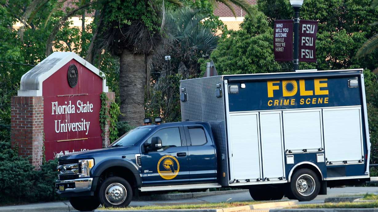 Crime scene vehicle at the Woodward Avenue entrance to the Florida State University campus after a shooting, in Tallahassee, Fla., Thursday.