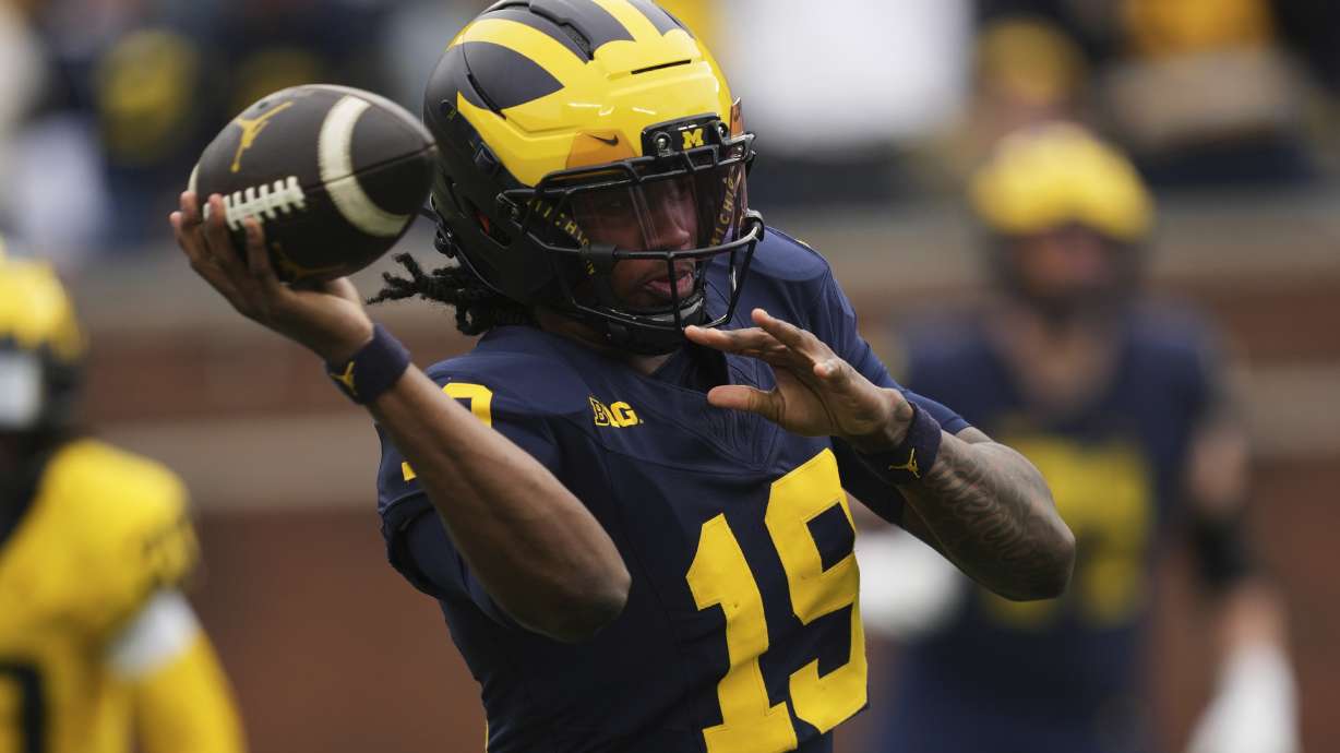Michigan quarterback Bryce Underwood throws during an NCAA college football spring game in Ann Arbor, Mich., Saturday, April 19, 2025.