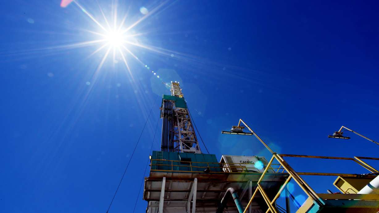 The sun beats down on the rig as a group of media take part in a tour of drilling rig at the FORGE geothermal demonstration site near Milford, Beaver County, on July 6, 2023.