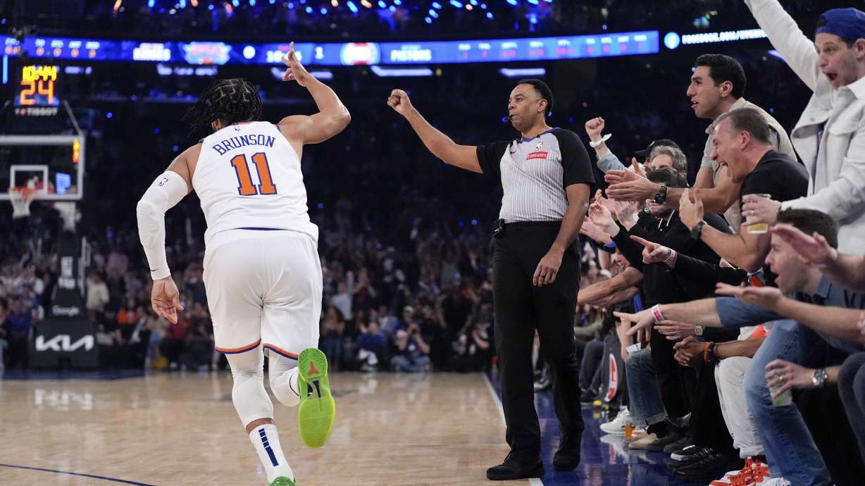 New York Knicks guard Jalen Brunson reacts after a three point shot during the first half of Game 1 in an NBA basketball first-round playoff series against the Detroit Pistons, Saturday, April 19, 2025, in New York.