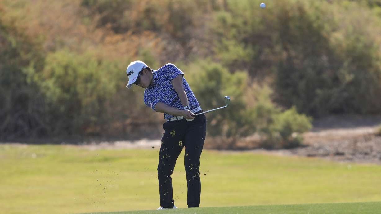 Akie Iwai, of Japan, hits from the 14th fairway during the first round of the Ford Championship LPGA golf event, Thursday, March 27, 2025, in Phoenix.