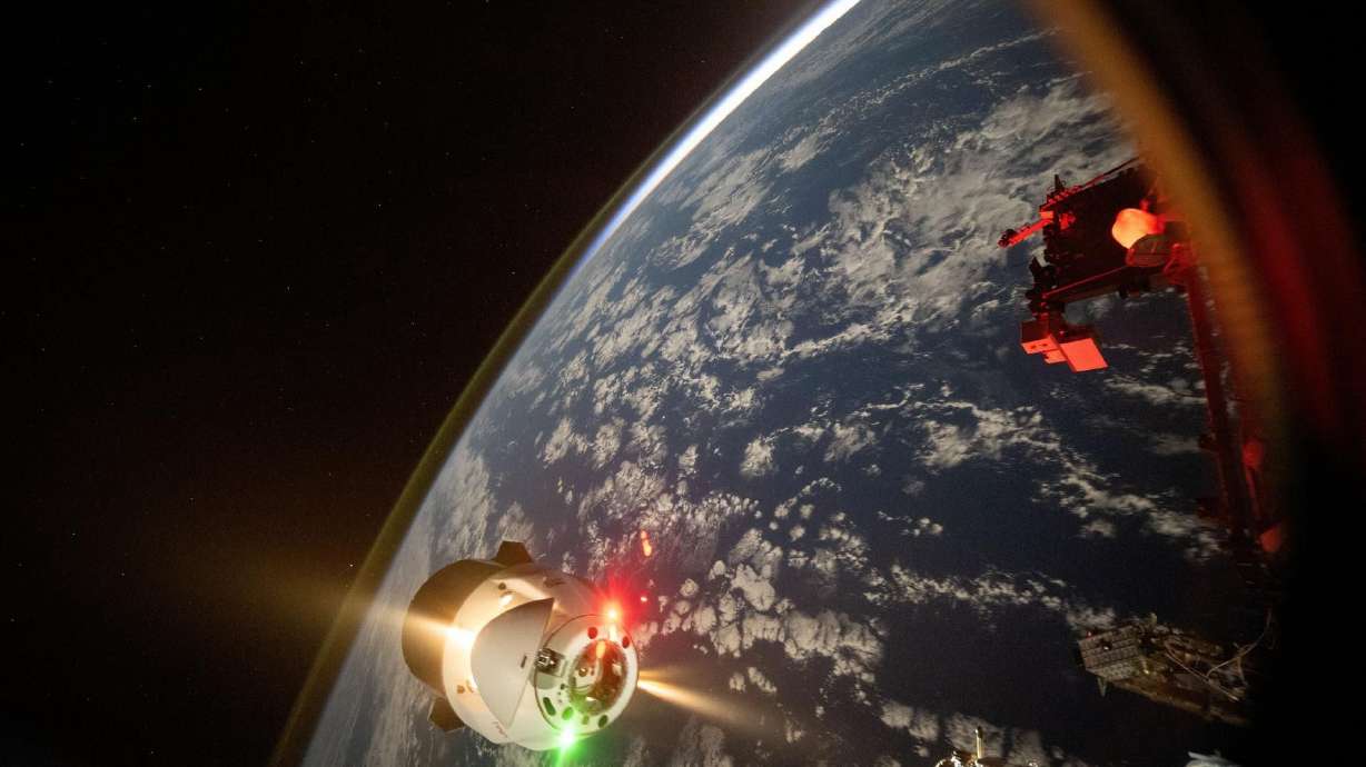 A frame from a time-lapse video shows thrusters firing on a SpaceX Dragon cargo spacecraft. Longtime NASA astronaut Don Pettit, returned to Earth after a seven-month stay aboard the International Space Station.