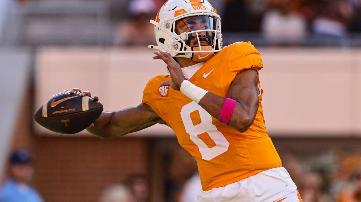 FILE - Tennessee quarterback Nico Iamaleava throws to a receiver during the first half of an NCAA college football game against Alabama, Saturday, Oct. 19, 2024, in Knoxville, Tenn.