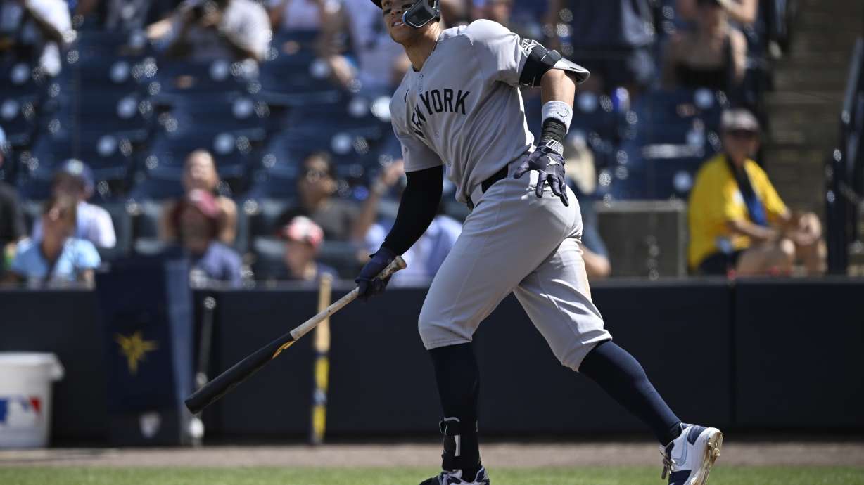 New York Yankees' Aaron Judge watches the flight of the ball as it is called foul during the eighth inning of a baseball game against the Tampa Bay Rays, Sunday, April 20, 2025, in Tampa, Fla.