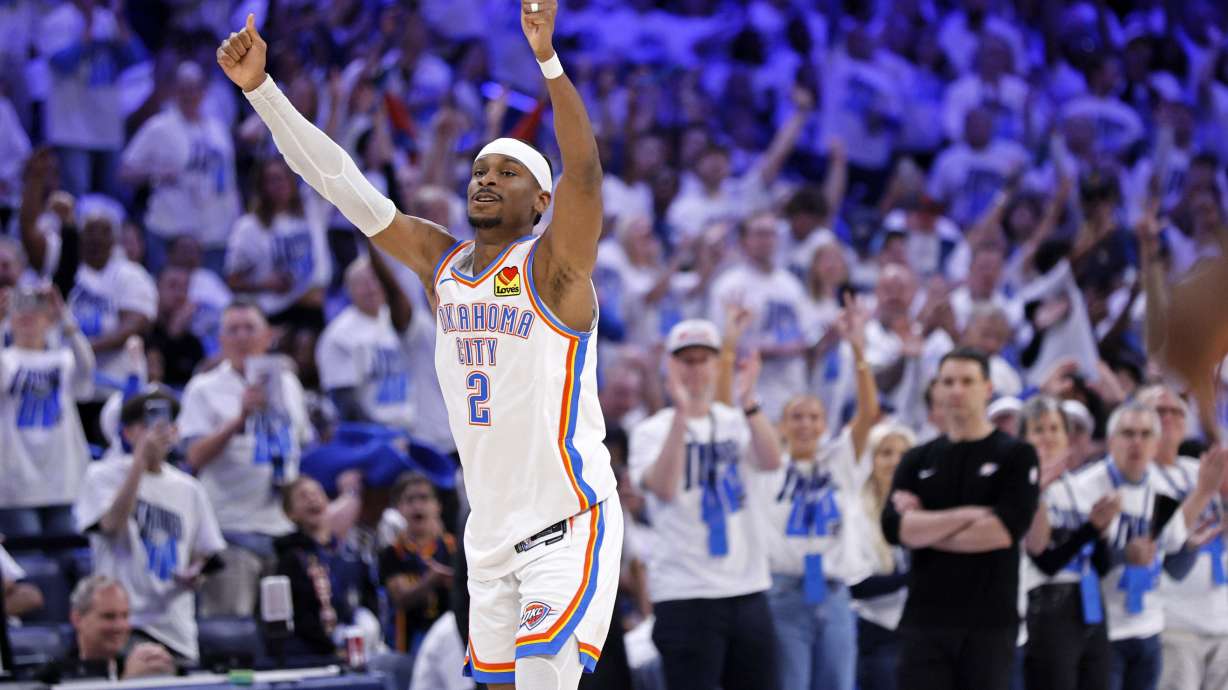 Oklahoma City Thunder guard Shai Gilgeous-Alexander reacts after making a basket during the first half in Game 1 of an NBA first-round playoff series against the Memphis Grizzlies, Sunday, April 20, 2025, in Oklahoma City.
