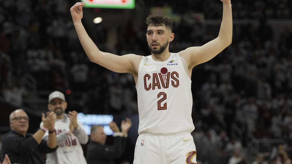 Cleveland Cavaliers guard Ty Jerome (2) gestures to fans in the second half in Game 1 of an NBA first-round playoff series against the Miami Heat, Sunday, April 20, 2025, in Cleveland.