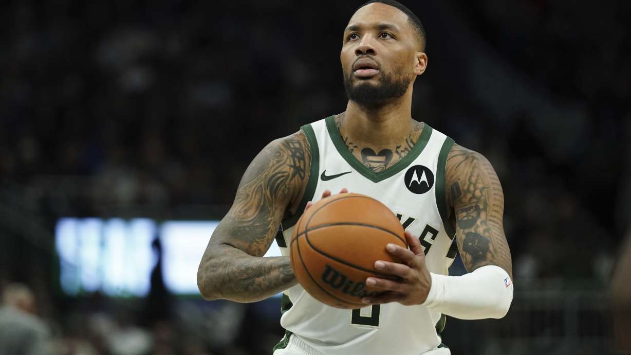 FILE - Milwaukee Bucks' Damian Lillard shoots a free throw during the second half of an NBA basketball game against the Orlando Magic, March 8, 2025, in Milwaukee.
