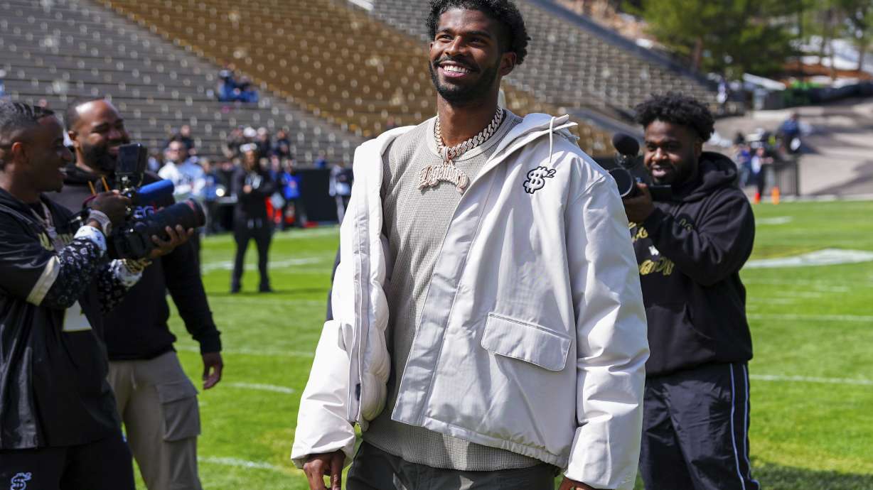 Shedeur Sanders looks on at his jersey retirement ceremony during Colorado's NCAA college football spring game, Saturday, April 19, 2025, in Boulder, Colo.