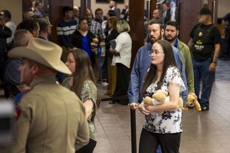 Families embrace as they leave the 409th District Court after Patrick Crusius pleaded guilty in the death of 23 people in the Aug. 3. 2019, Walmart Mass shooting, Monday.