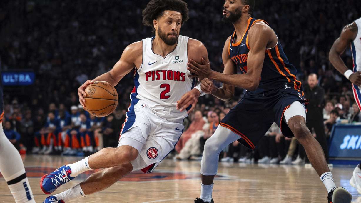 Detroit Pistons guard Cade Cunningham (2) drives toward the basket against New York Knicks' Mikal Bridges during the first half of Game 2 of an NBA basketball first-round playoff series, Monday, April 21, 2025, in New York.