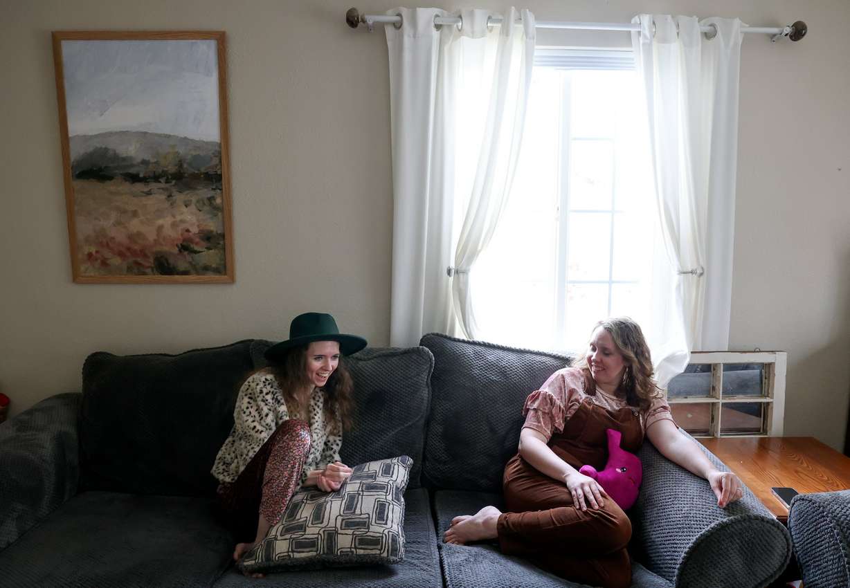 Ashlyne Hatch and her sister, Chari Dickson, chat as Dickson recovers from having her stomach removed a week earlier, at Hatch’s home in Mapleton on April 16. They both have the SMAD4 gene mutation, which leads to polyps in the digestive tract and eventually cancer.