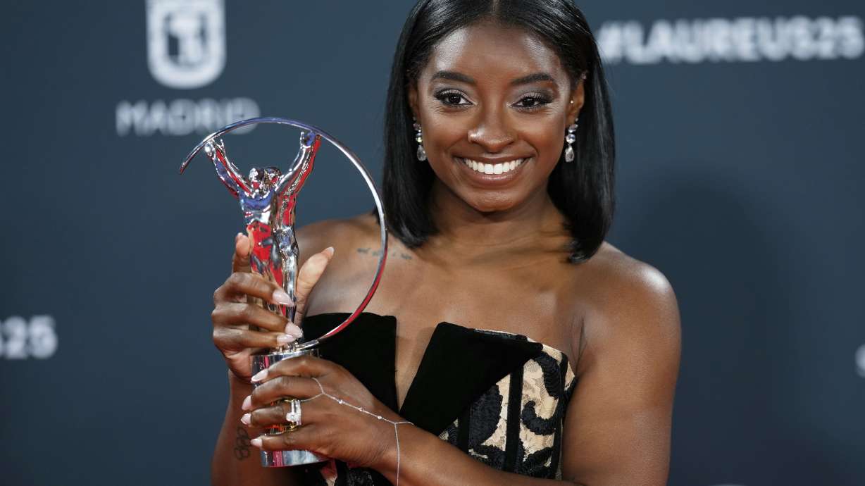Simone Biles celebrates her Laureus World Sportswoman of the Year award, during the 2025 Laureus World Sports Awards ceremony in Madrid, April 21, 2025.