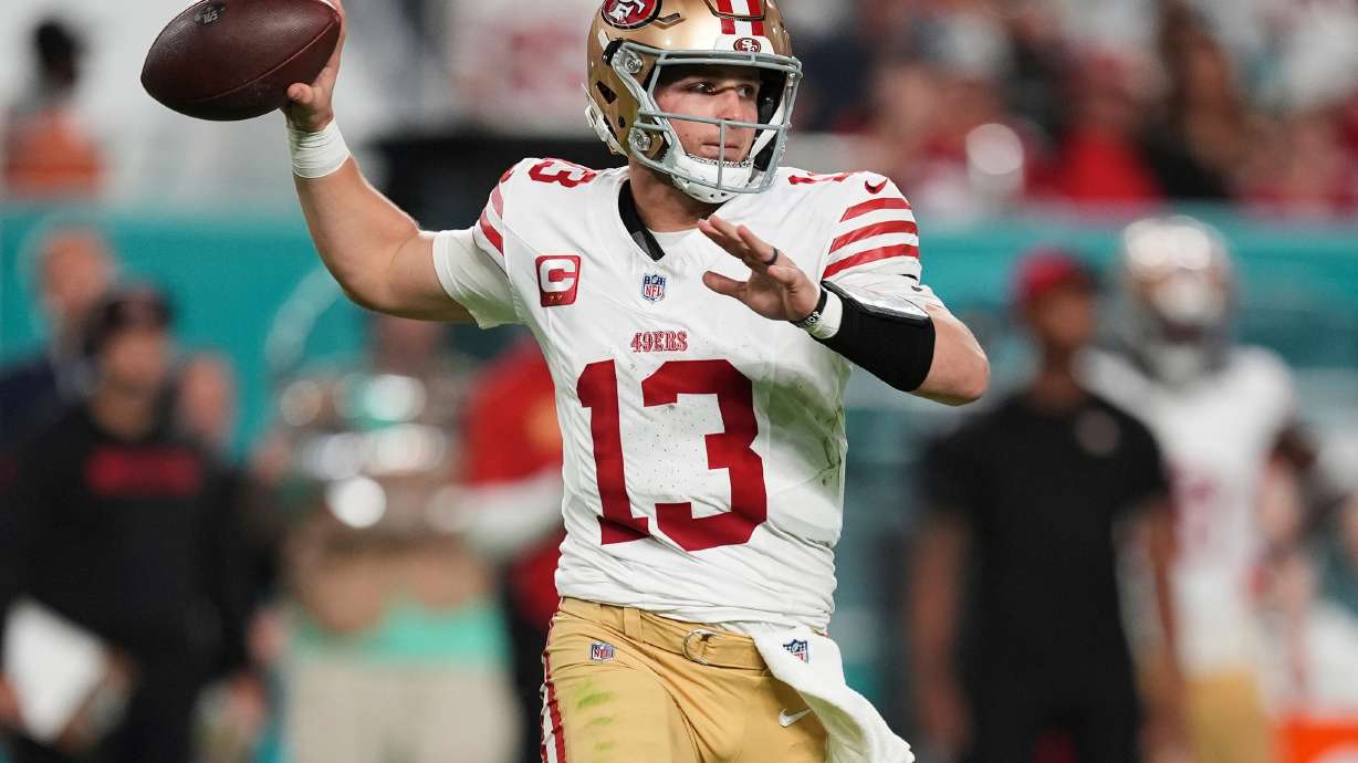 FILE - San Francisco 49ers quarterback Brock Purdy (13) aims a pass during the second half of an NFL football game against the Miami Dolphins, Sunday, Dec. 22, 2024, in Miami Gardens, Fla.