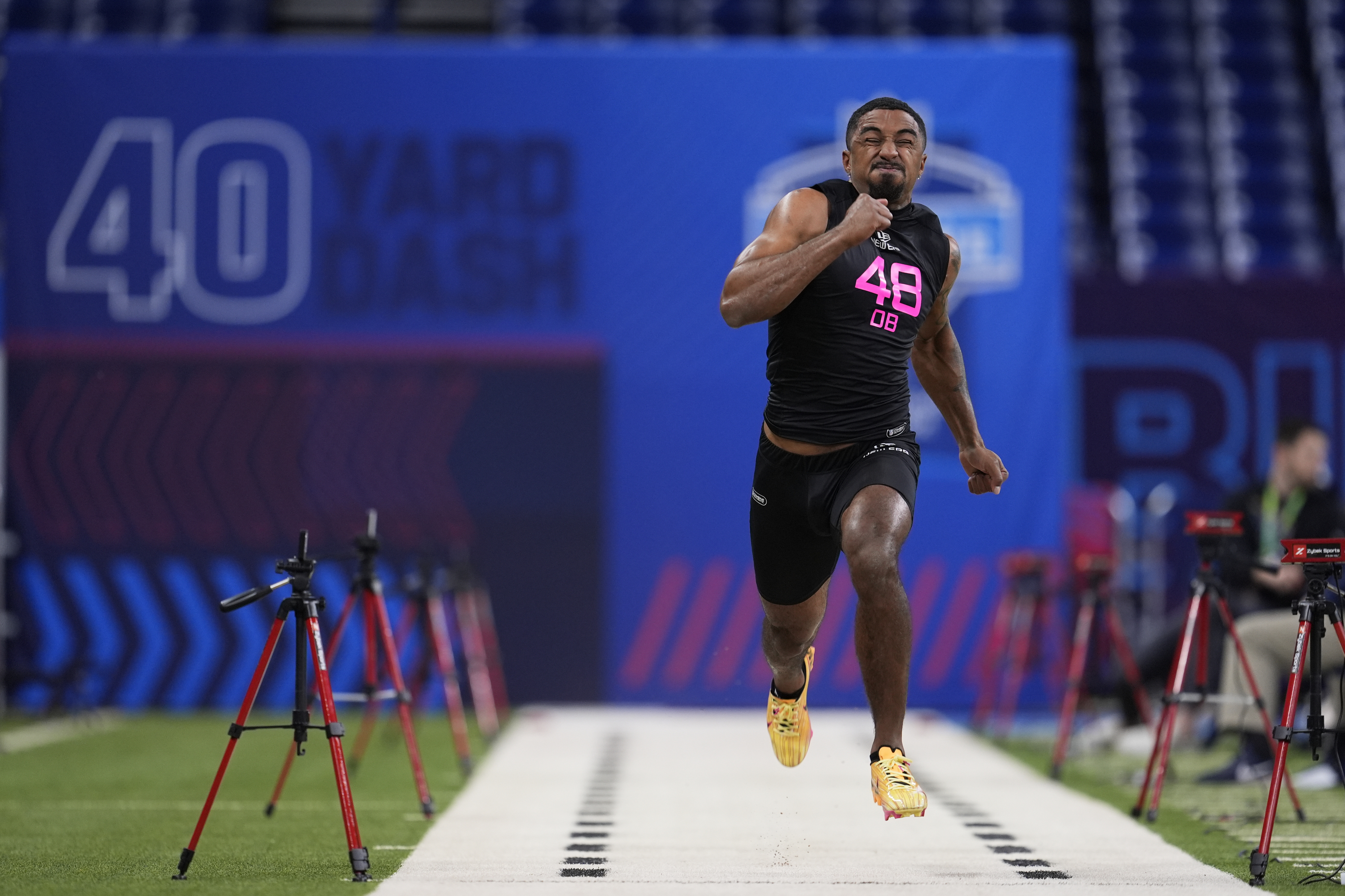 FILE - Virginia defensive back Jonas Sanker runs the 40-yard dash at the NFL football scouting combine on Feb. 28, 2025, in Indianapolis.