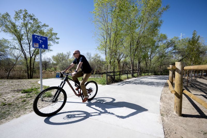 Millcreek officially opens a new park, trail and boat launch along the Jordan River at 1015 West and 4000 South on Tuesday. - Scott G Winterton, Deseret News