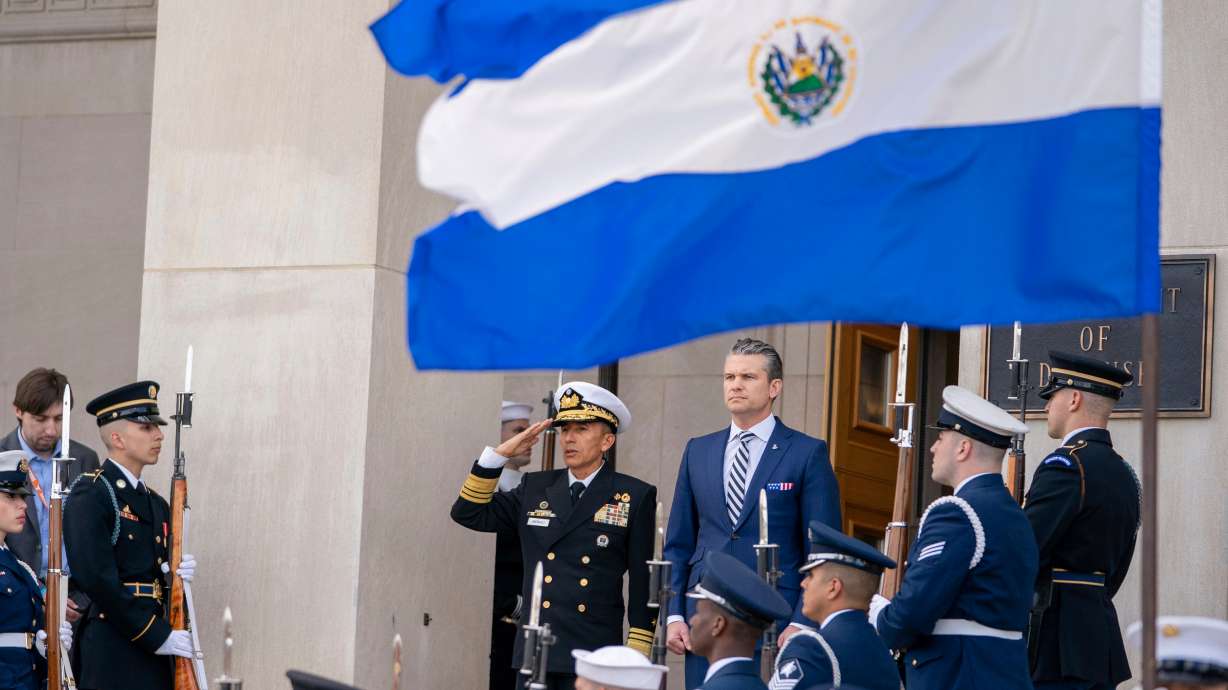 Defense Secretary Pete Hegseth, right, welcomes El Salvador's Minister of National Defense Rene Merino Monroy, left, to the Pentagon in Washington on April 16. A temporary immigration program geared to Salvadorans remains intact.