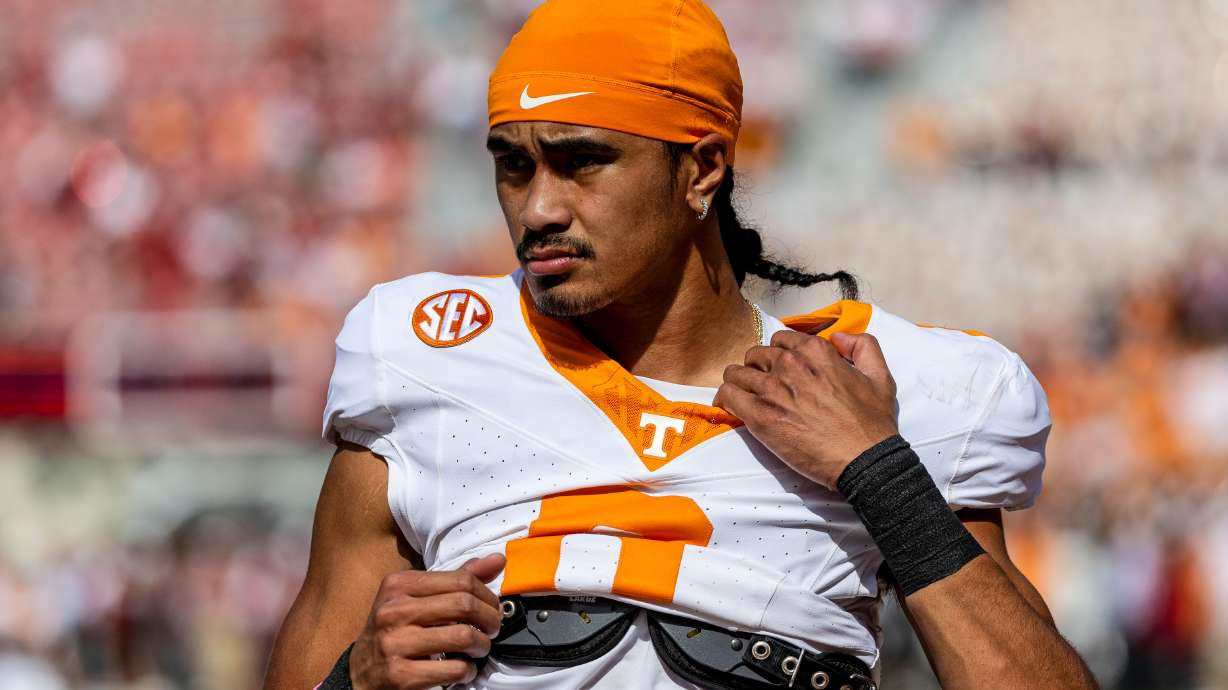 FILE - Tennessee quarterback Nico Iamaleava (8) warms up before an NCAA college football game against Alabama, Saturday, Oct. 21, 2023, in Tuscaloosa, Ala.