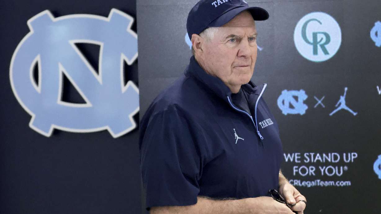 FILE - North Carolina coach Bill Belichick arrives for an NCAA college football press conference, March 5, 2025, in Chapel Hill, N.C.