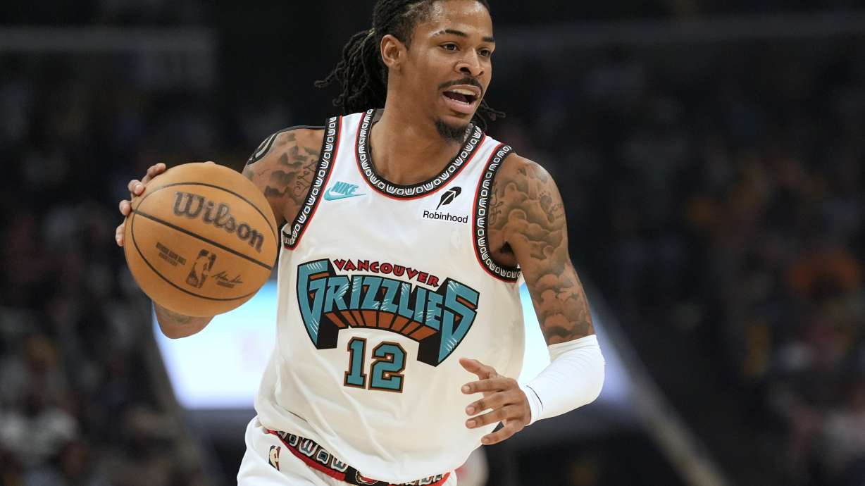 File - Memphis Grizzlies guard Ja Morant (12) plays during the first half of an NBA play-in tournament basketball game Friday, April 18, 2025, in Memphis, Tenn.