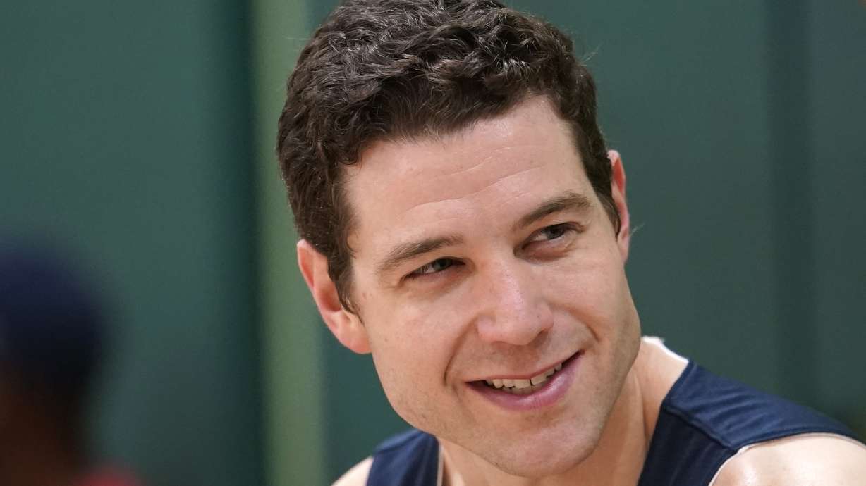 FILE - Jimmer Fredette speaks during an interview after practice for the USA Basketball 3x3 national team, Monday, Oct. 31, 2022, in Miami Lakes, Fla.