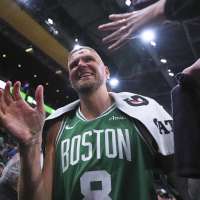 Celtics' Kristaps Porzingis elbowed in forehead, gushes blood, returns to finish win over Magic