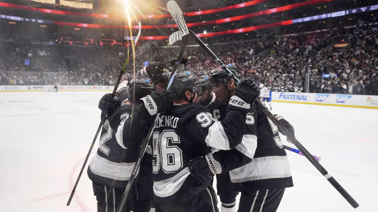 Los Angeles Kings left wing Andrei Kuzmenko (96) celebrates his goal with teammates during the second period in Game 2 of an NHL hockey first-round playoff series Edmonton Oilers, Wednesday, April 23, 2025, in Los Angeles.